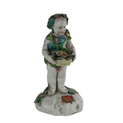 Porcelain Figurine Boy with Basket of Flowers