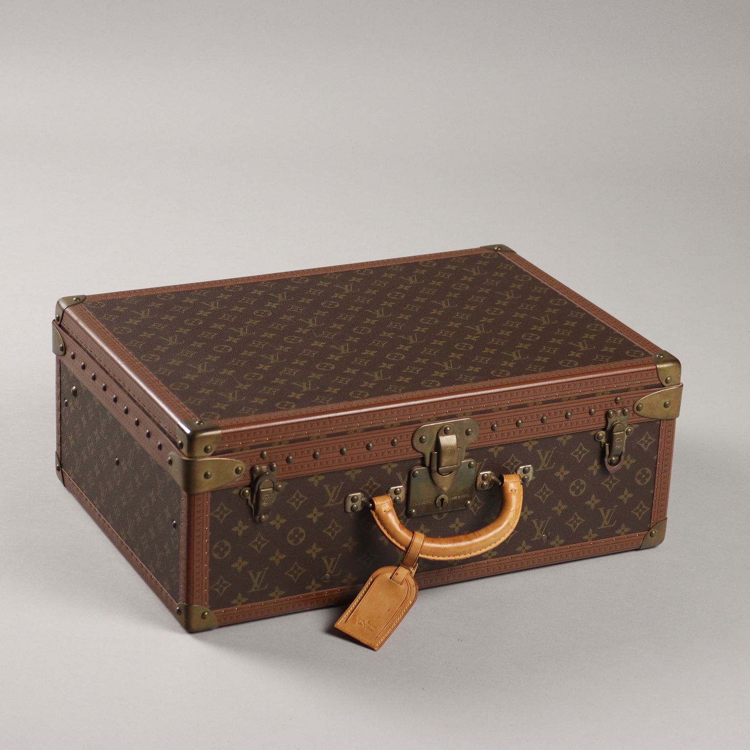 Valise Louis Vuitton Alzer 55  Vetêments et Textiles Vintage