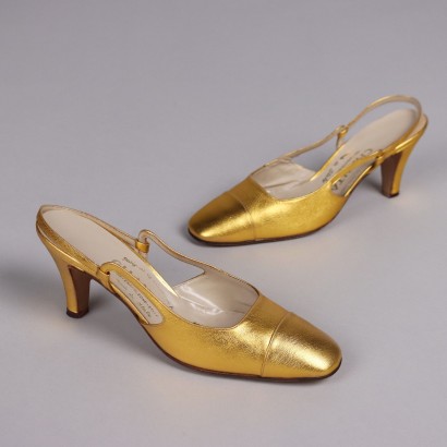 Zapatos dorados antiguos