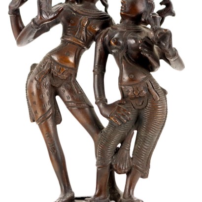 Krishna con una escultura de bronce Gopi