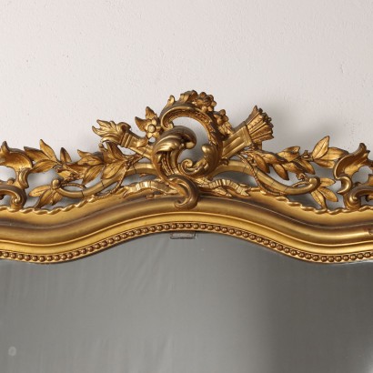 Espejo ecléctico en madera dorada