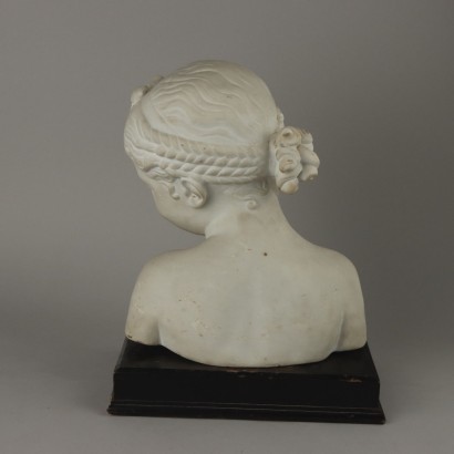 Bust of a Girl in White Marble