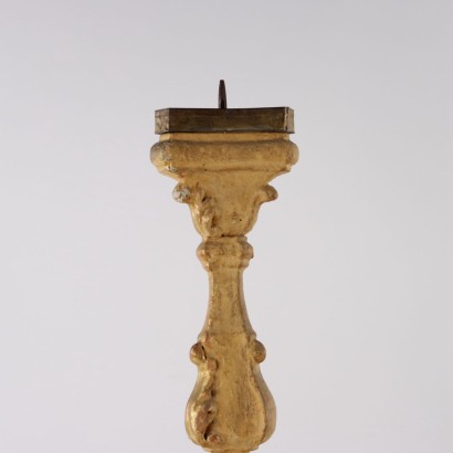 Porte-flambeaux en bois sculpté et doré