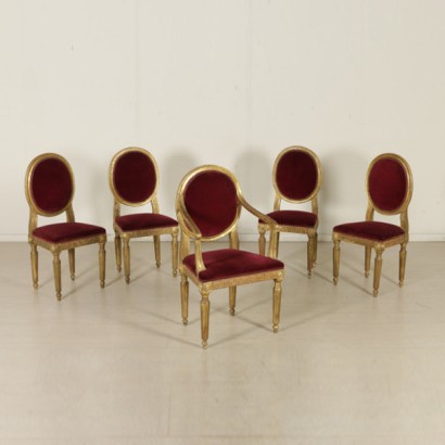 Gruppo quattro sedie neoclassiche e poltrona