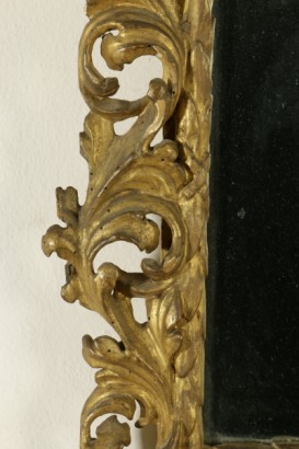 Par de espejos-detalle de tallado y dorado