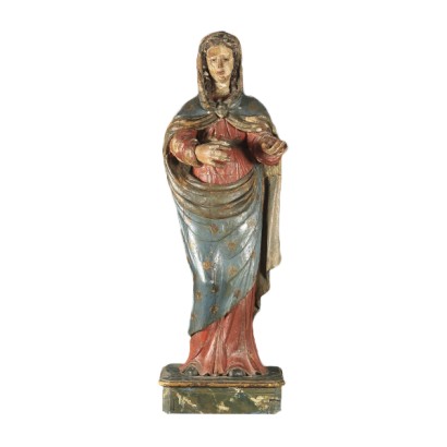 A wooden statue of the Madonna