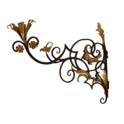 Wall sconce in wrought iron