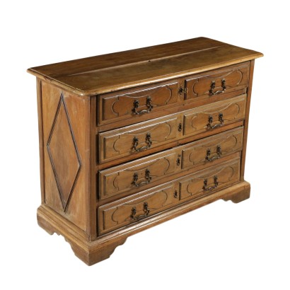 A chest of drawers with Four Drawers