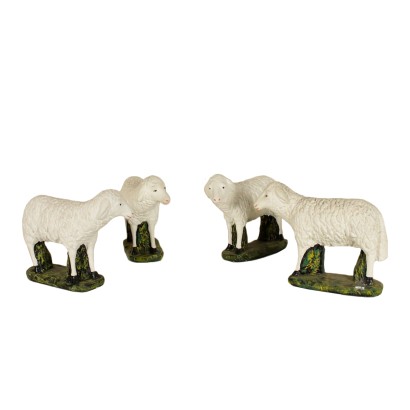 Groupe de quatre Moutons Stuc Peint en polychrome Italie XXeme siècle