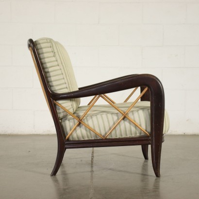 Poltrona nello stile di Paolo Buffa, legno di faggio e noce, cuscino di seduta a molle su cinghie metalliche, schienale in espanso, rivestimento in tessuto. Personalizzabile.