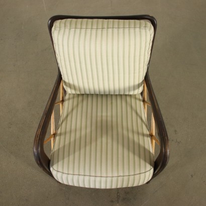 Sillón estilo Paolo Buffa, madera de haya y nogal, cojín de asiento con muelles en correas metálicas, respaldo de espuma, tapizado en tela. Personalizable.