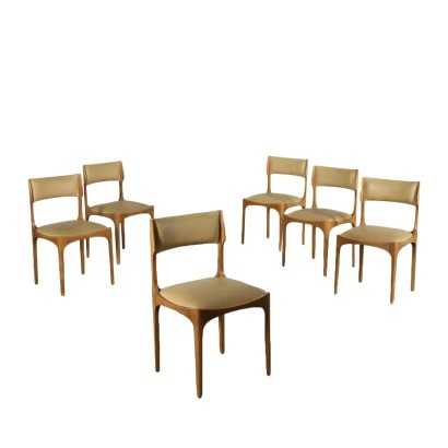 Giuseppe Gibelli chairs, 1960s. Group of six chairs, beech wood, foam padding, imitation leather upholstery.
