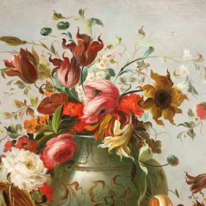 Composition florale avec perroquet