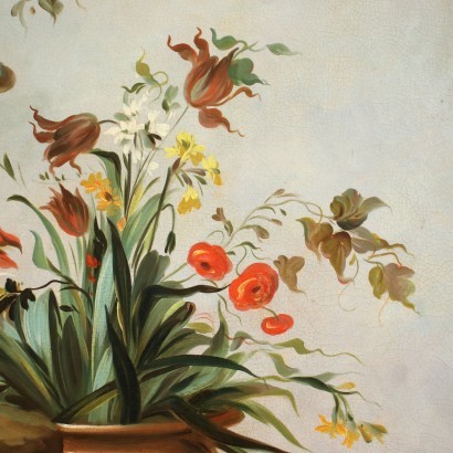 Composition florale avec perroquet