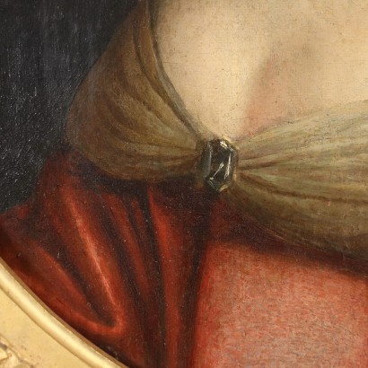 Retrato de mujer con collar de perlas.