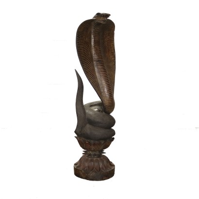 Escultura de madera de cobra